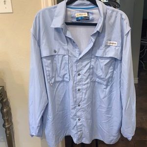 Light blue men’s Magellan fishing shirt.
